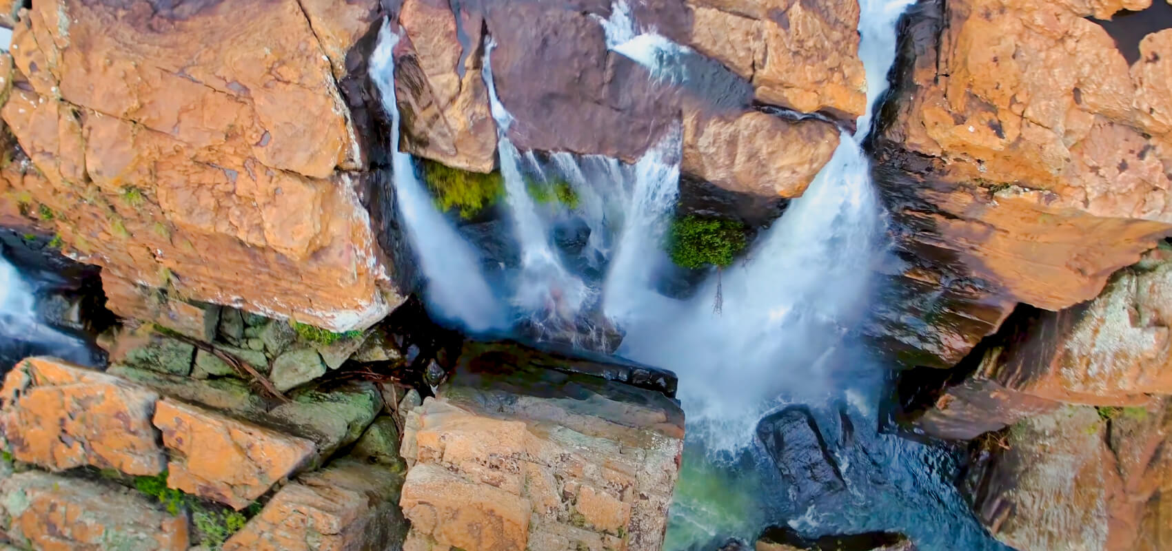 Amber Treur Falls cascading gracefully into a green gorge, Panorama Route, Mpumalanga.