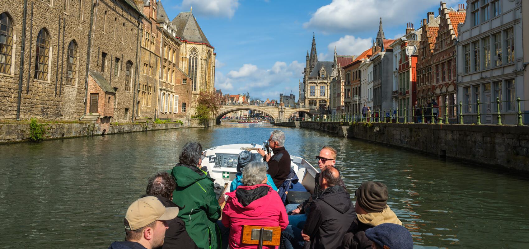View of Ghent's canals and historic buildings from a boat tour