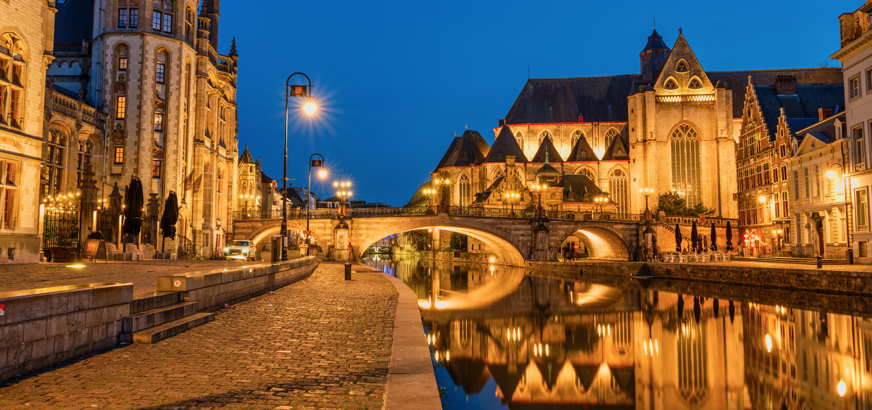 Graslei and Korenlei Quays lined with historic guildhalls along the Leie River in Ghent