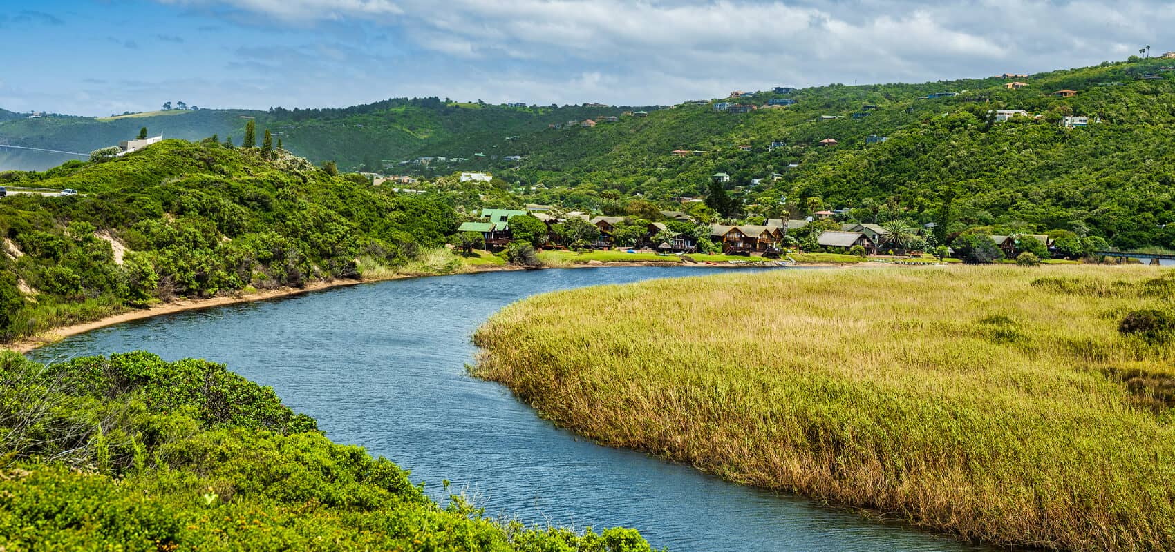 Serene river flowing through Wilderness on South Africa's stunning Garden Route